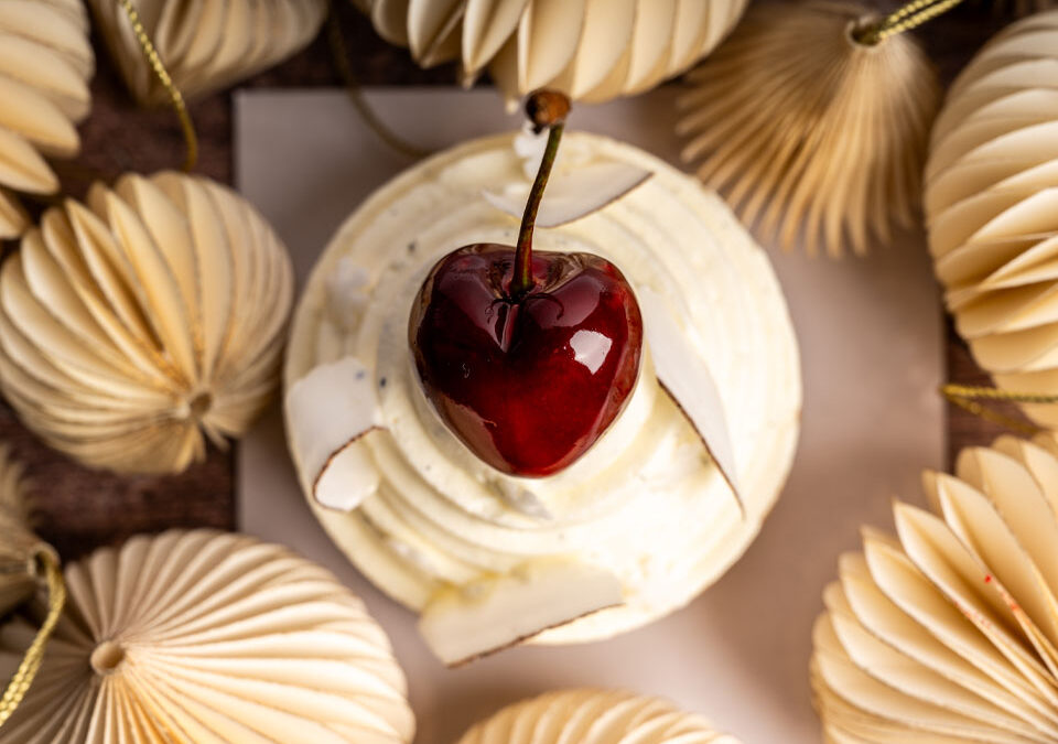 Picture of cakes and biscuits with a cherry heart in the middle