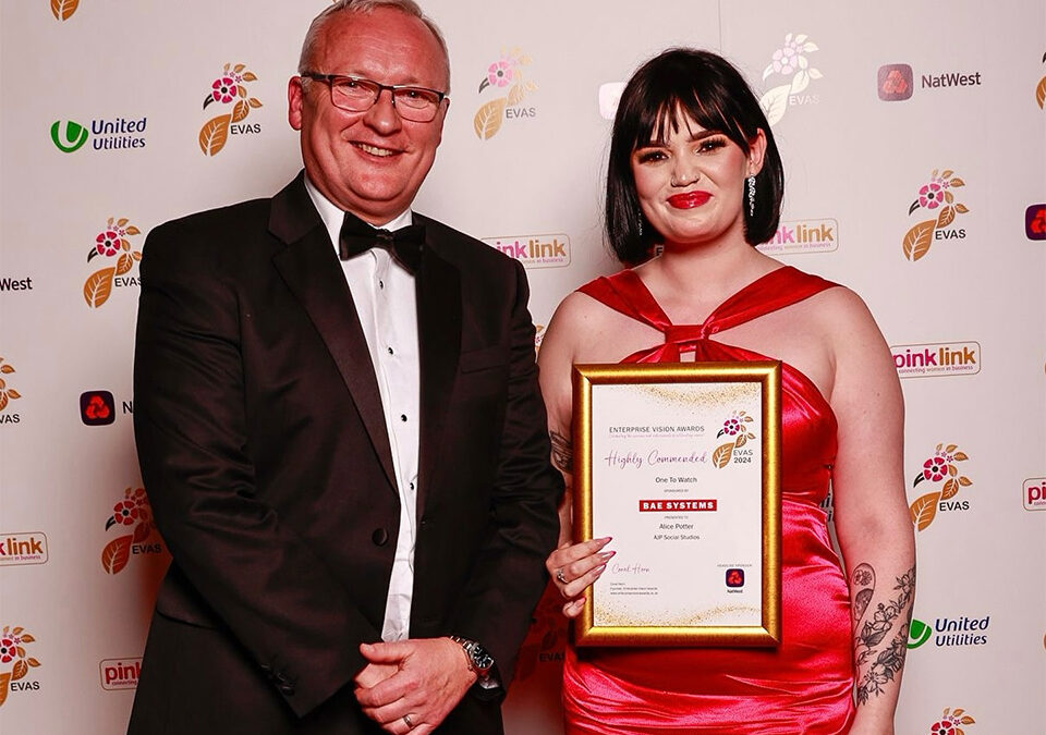 Alice Potter receiving an award for her business AJP Social Studio