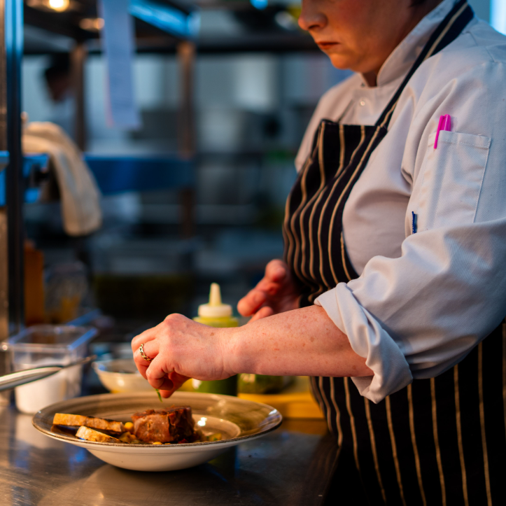 a chef cooking in the kitchen