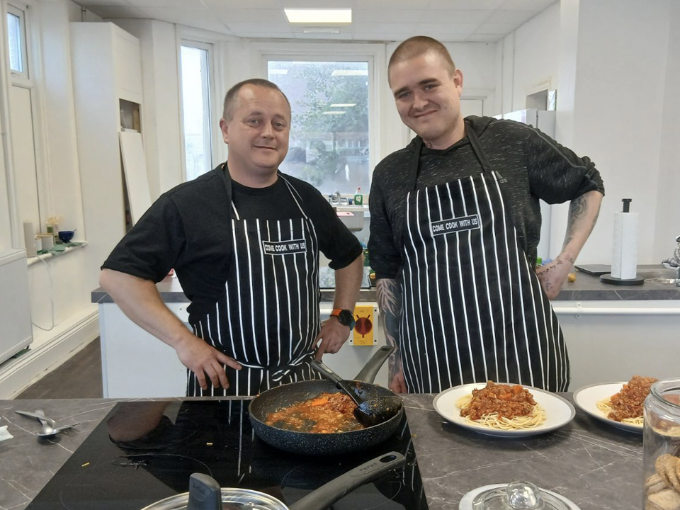 showing volunteers in the kitchen 